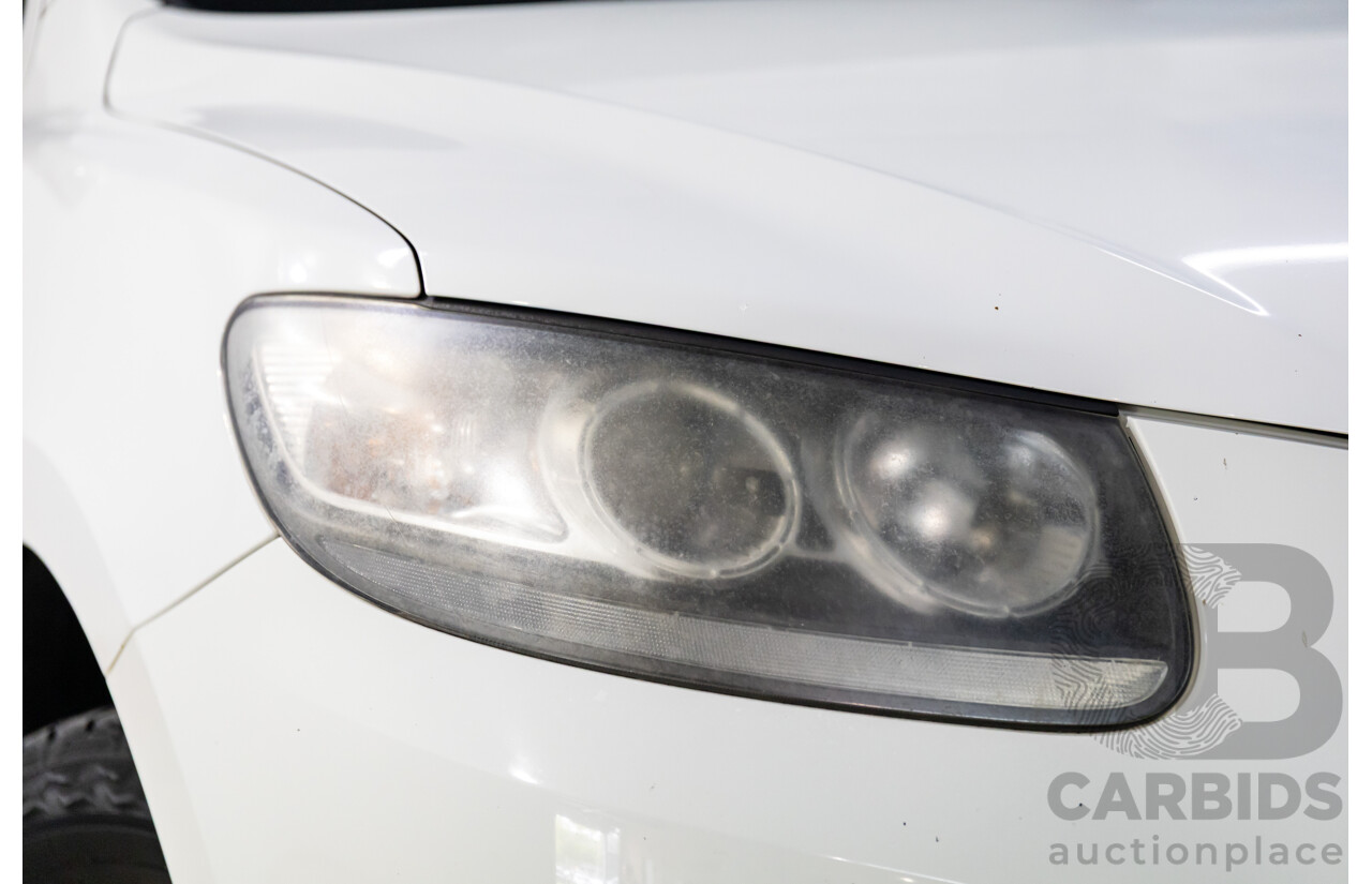 3/2010 Hyundai Santa Fe Elite CRDi (4x4) CM MY10 4d Wagon Vanilla White Turbo Diesel 2.2L - 7 Seater