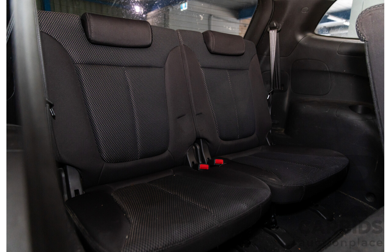 3/2010 Hyundai Santa Fe Elite CRDi (4x4) CM MY10 4d Wagon Vanilla White Turbo Diesel 2.2L - 7 Seater