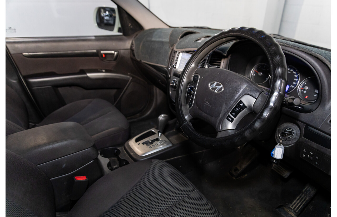 3/2010 Hyundai Santa Fe Elite CRDi (4x4) CM MY10 4d Wagon Vanilla White Turbo Diesel 2.2L - 7 Seater