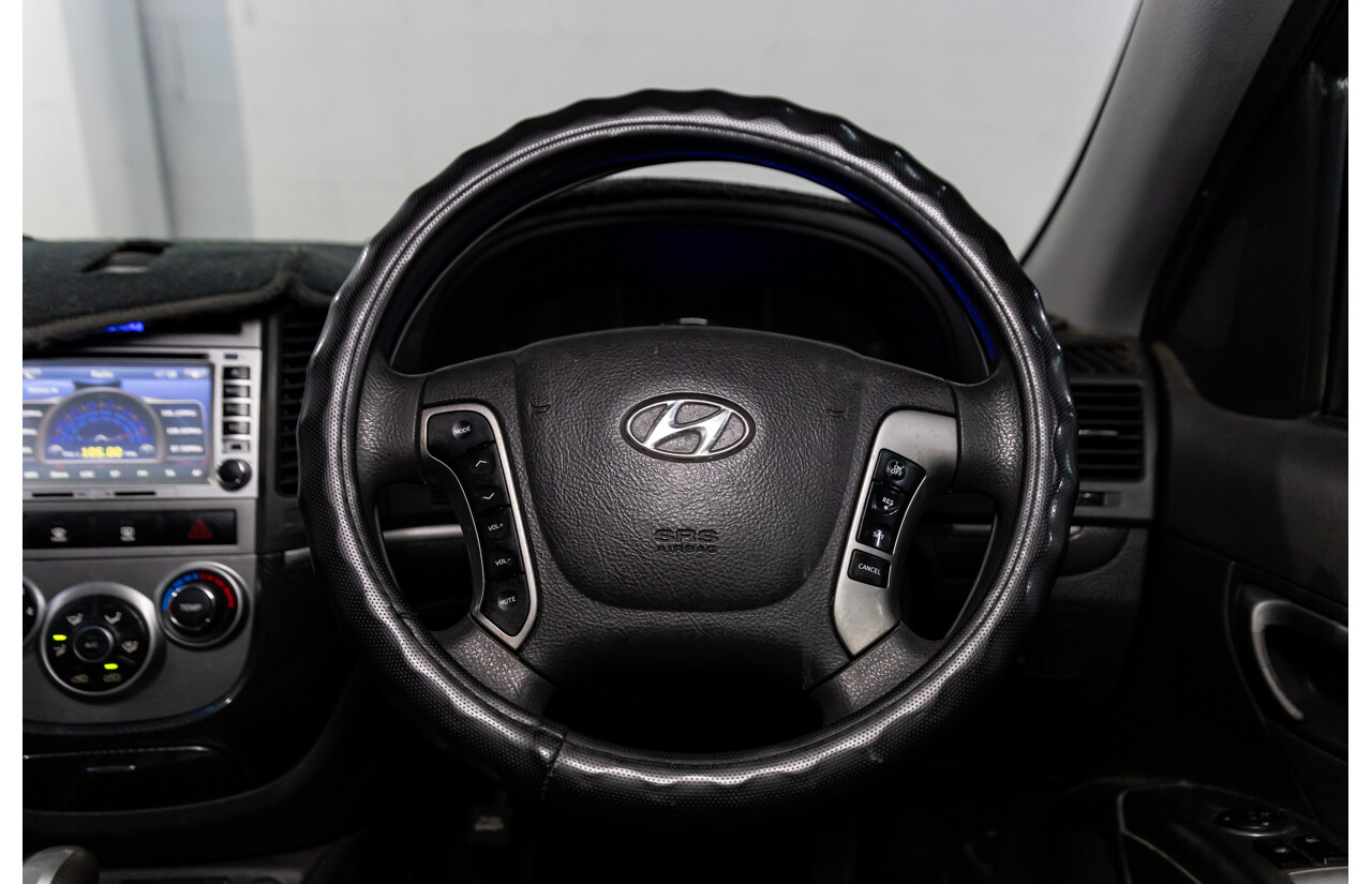 3/2010 Hyundai Santa Fe Elite CRDi (4x4) CM MY10 4d Wagon Vanilla White Turbo Diesel 2.2L - 7 Seater