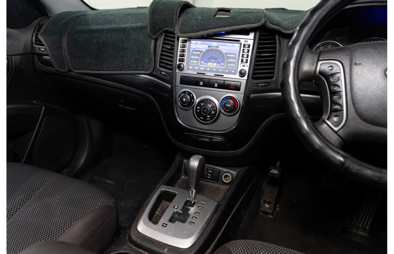 3/2010 Hyundai Santa Fe Elite CRDi (4x4) CM MY10 4d Wagon Vanilla White Turbo Diesel 2.2L - 7 Seater