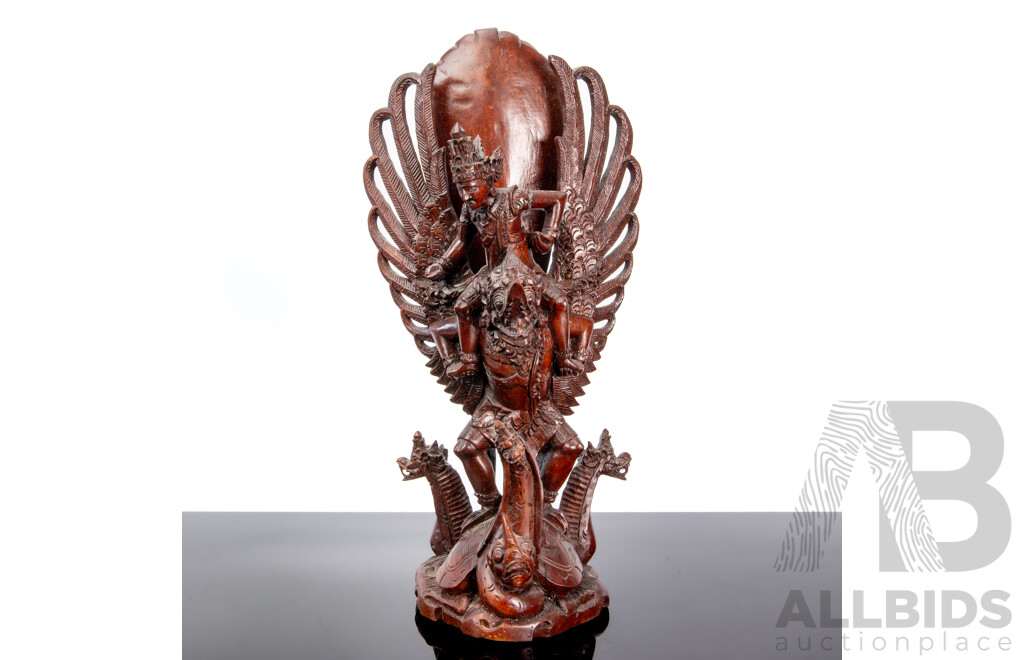 Balinese Wood Carving of Vishnu Riding Garuda by Fatimah