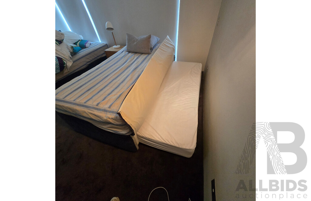 2 X Single Beds, 1 Has a Trundle Bed Undeneath, Bedside Table and Lamp - Plus All Linen Including Extra Set for Each as per Photos