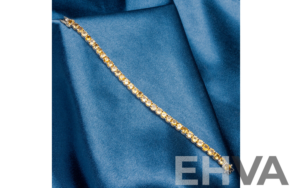 925 Sterling Silver Tennis Bracelet with Round Citrines. Length - 18.5cms