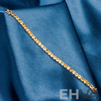 925 Sterling Silver Tennis Bracelet with Round Citrines. Length - 18.5cms