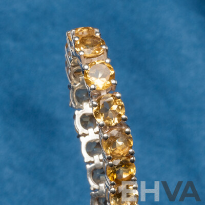 925 Sterling Silver Tennis Bracelet with Round Citrines. Length - 18.5cms