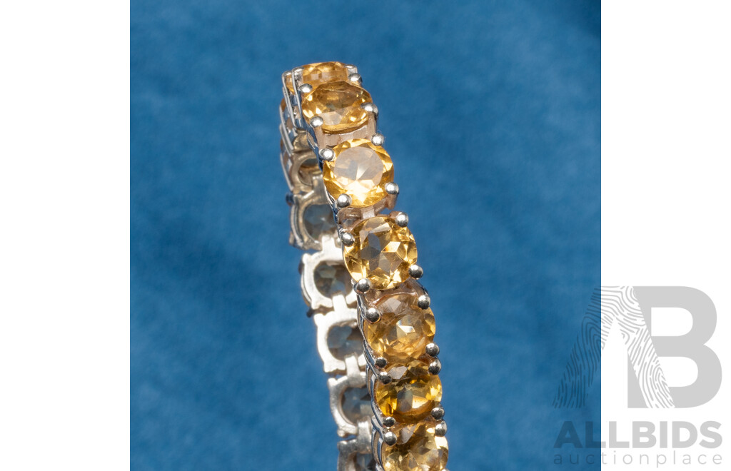 925 Sterling Silver Tennis Bracelet with Round Citrines. Length - 18.5cms
