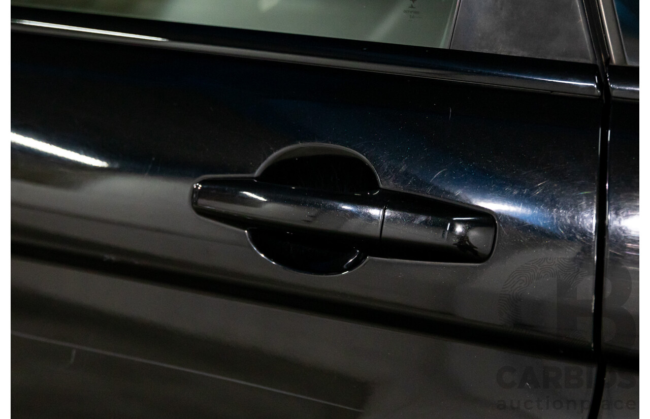 1/2015 Range Rover Evoque SD4 Pure LV MY15 5d Wagon Santorini Black Turbo Diesel 2.2L