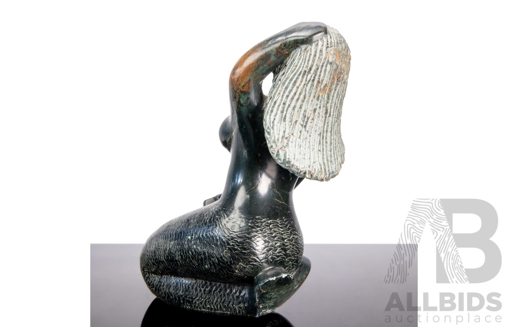 Naieve Shona Stone Carving of a Seated Mermaid