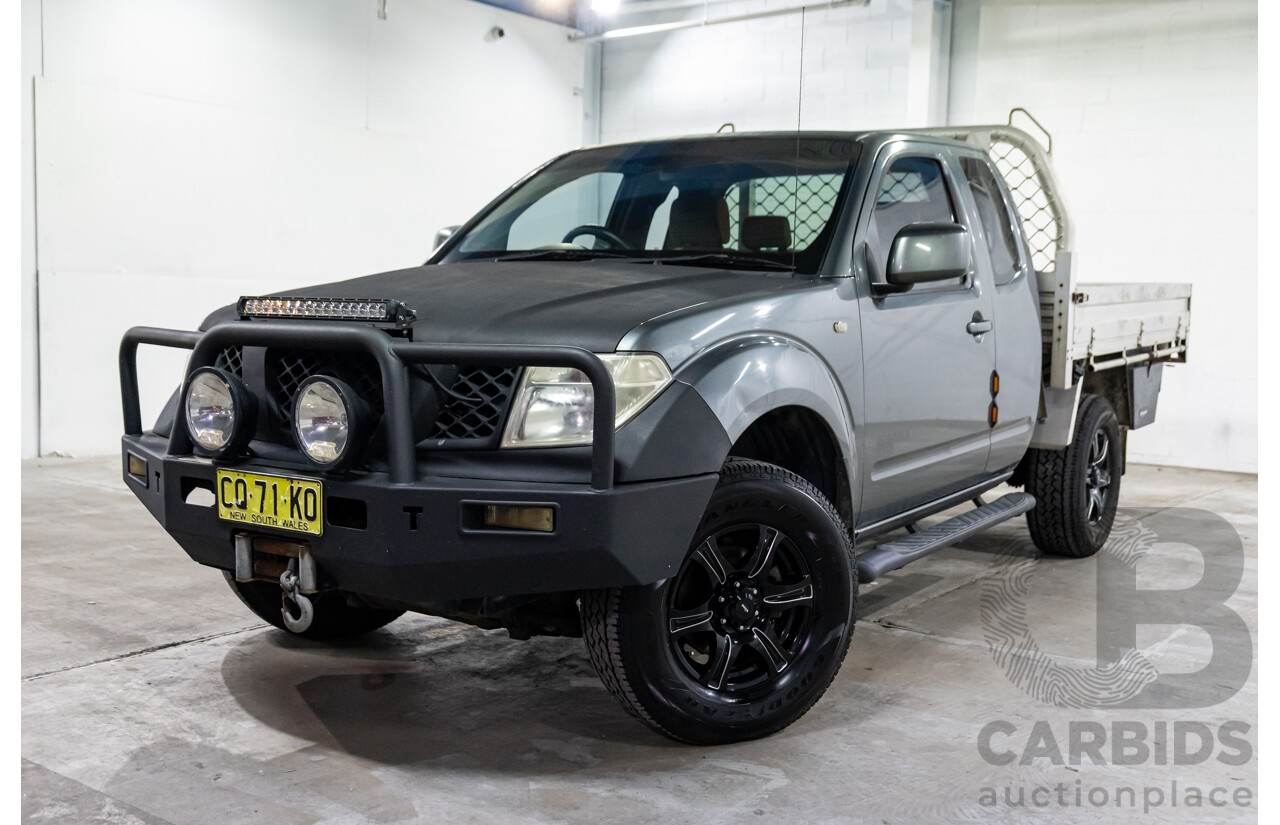 9/2009 Nissan Navara ST-X (4x4) D40 King Cab Chassis Slate Grey Metallic Turbo Diesel 2.5L