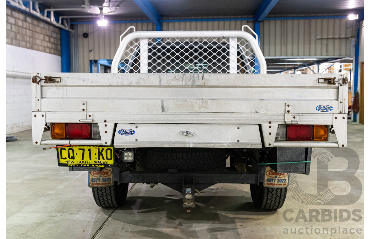 9/2009 Nissan Navara ST-X (4x4) D40 King Cab Chassis Slate Grey Metallic Turbo Diesel 2.5L