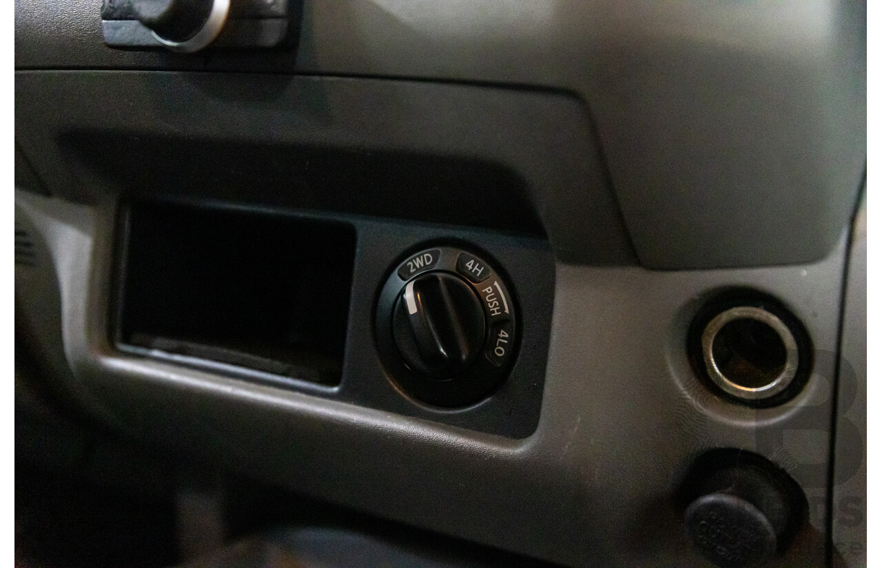 9/2009 Nissan Navara ST-X (4x4) D40 King Cab Chassis Slate Grey Metallic Turbo Diesel 2.5L