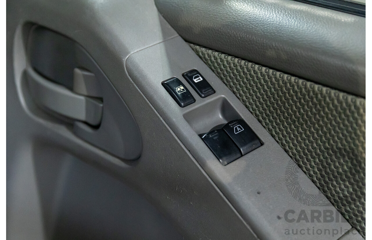 9/2009 Nissan Navara ST-X (4x4) D40 King Cab Chassis Slate Grey Metallic Turbo Diesel 2.5L