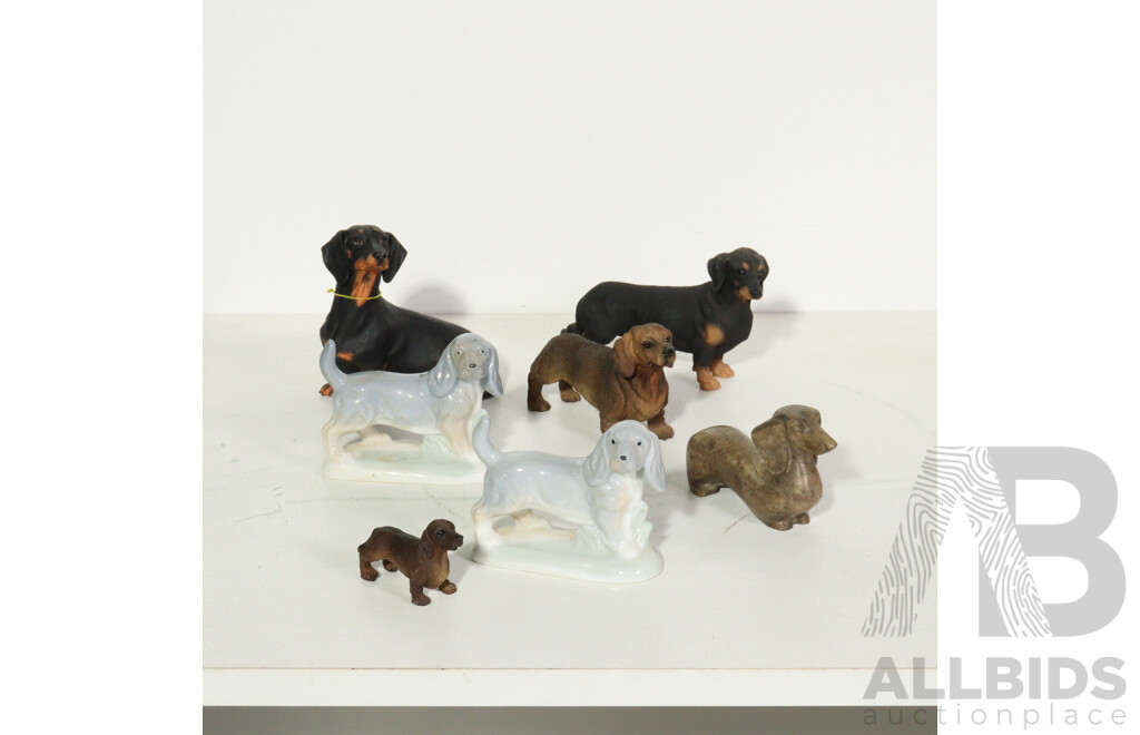 Seven Dachshund Figurines Including Ceramic, Resin and Canine Kingdom Examples