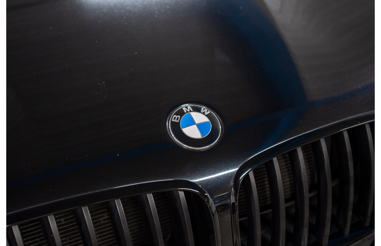 7/2011 BMW X5 M (AWD) E70 MY10 4d Wagon Black Sapphire Metallic Twin Turbo V8 4.4L