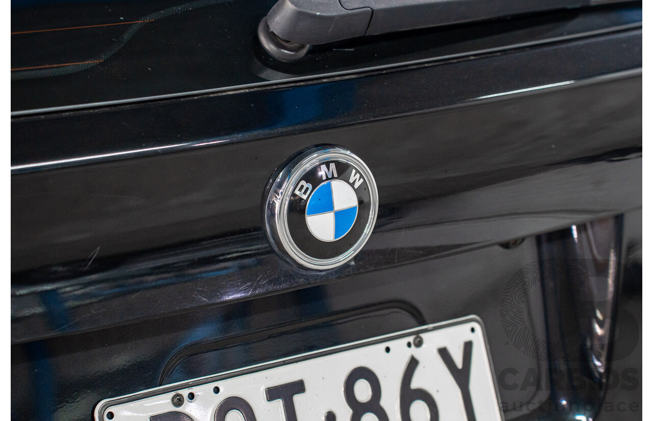 7/2011 BMW X5 M (AWD) E70 MY10 4d Wagon Black Sapphire Metallic Twin Turbo V8 4.4L