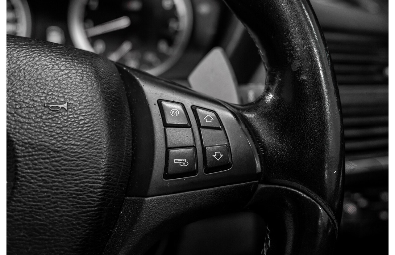 7/2011 BMW X5 M (AWD) E70 MY10 4d Wagon Black Sapphire Metallic Twin Turbo V8 4.4L