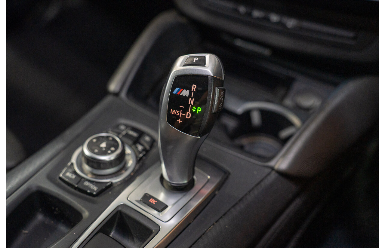 7/2011 BMW X5 M (AWD) E70 MY10 4d Wagon Black Sapphire Metallic Twin Turbo V8 4.4L