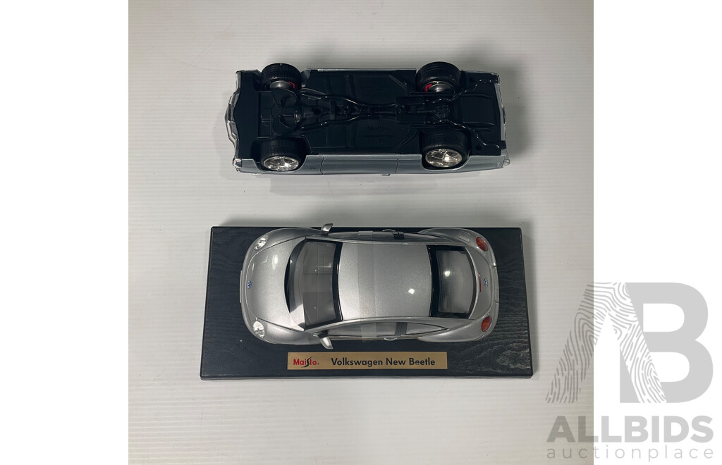 Pair of Maisto Cars Including Volkswagen New Beetle and Chevrolet Chevelle 1:18 Scale Models