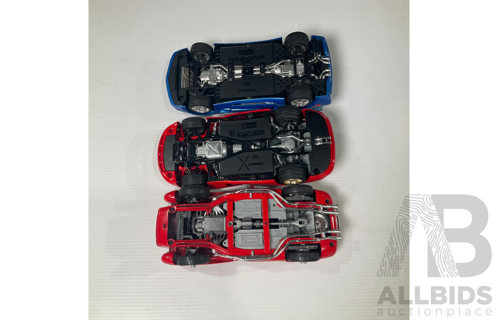 Set of Three Bburago Model Cars Including Chevrolet Corvette C5, Viper Dodge GTS Coupe and Ferrari 250 Testa Rossa 1:18 Scale Models