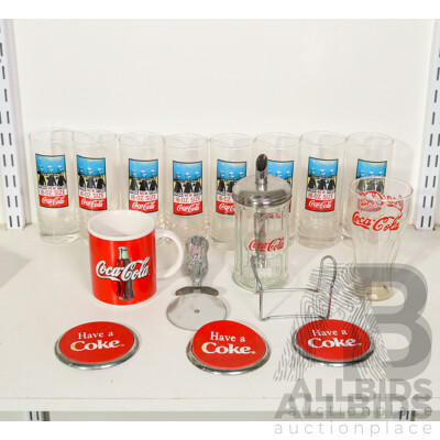 Collection of Coca Cola Paraphernalia Including Glass Cups, Pizza Cutter, Coasters and More