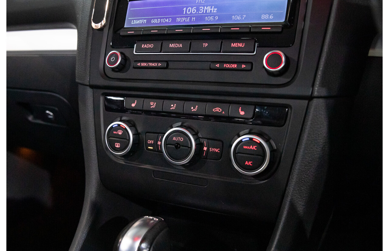 1/2013 Volkswagen Golf 118 TSI 1C MY13 2d Cabriolet Sunset Red Metallic Twincharged 1.4L