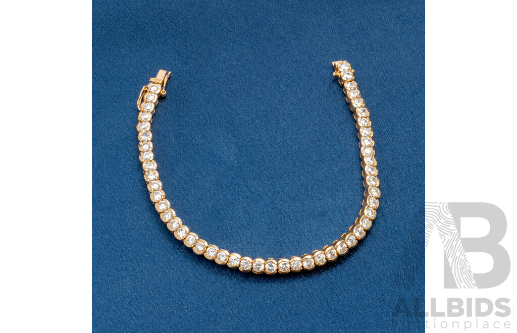 925 Sterling Silver Gold Plated Tennis Bracelet With Cubic Zirconias. Length - 19.5cms