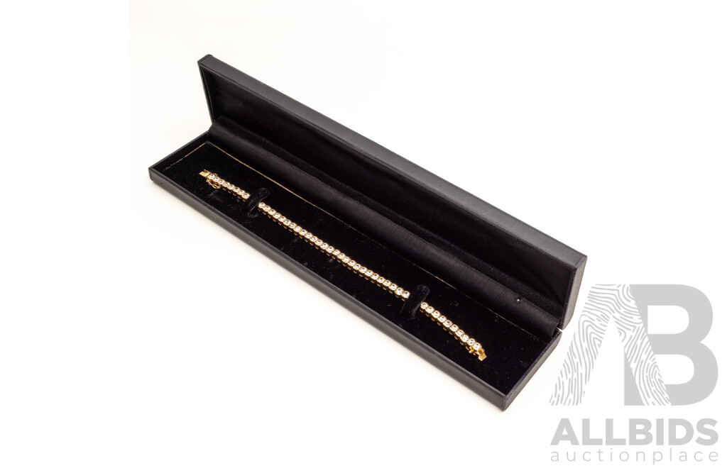 925 Sterling Silver Gold Plated Tennis Bracelet With Cubic Zirconias. Length - 19.5cms