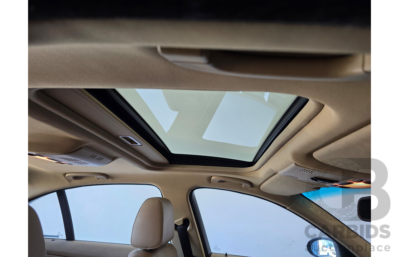 6/2006 BMW 325i E90 4d Sedan Gold 2.5L