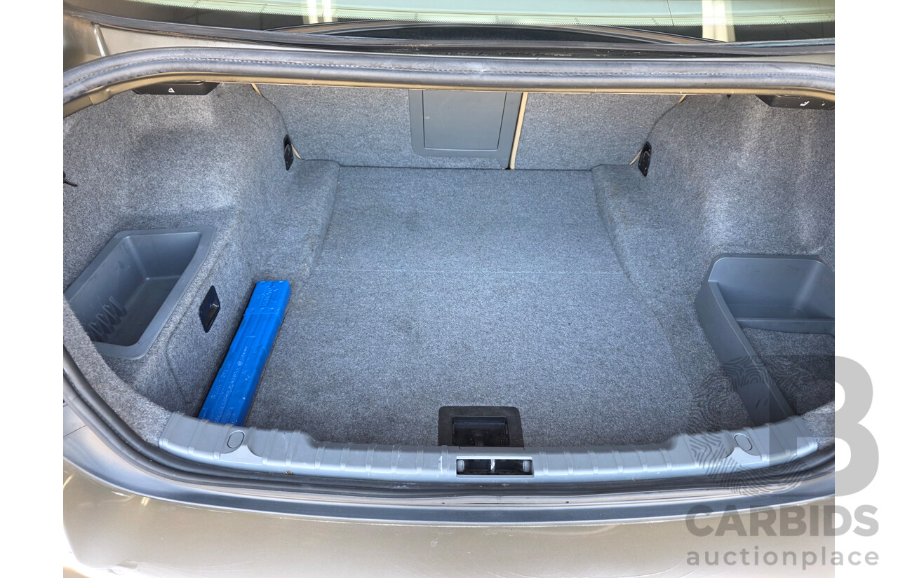 6/2006 BMW 325i E90 4d Sedan Gold 2.5L