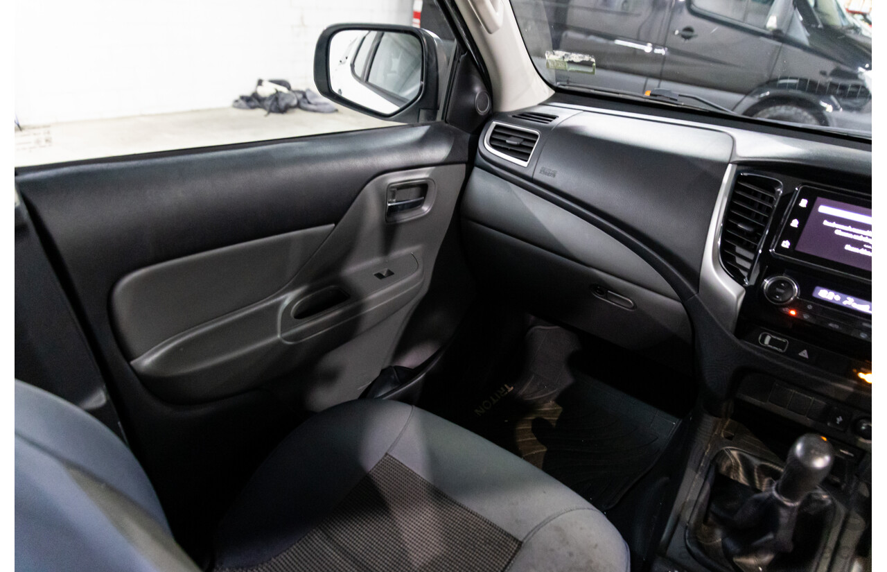 04/2018 Mitsubishi Triton GLX Plus (4x4) MQ MY18 Dual Cab Utility Solid White Turbo Diesel 2.4L