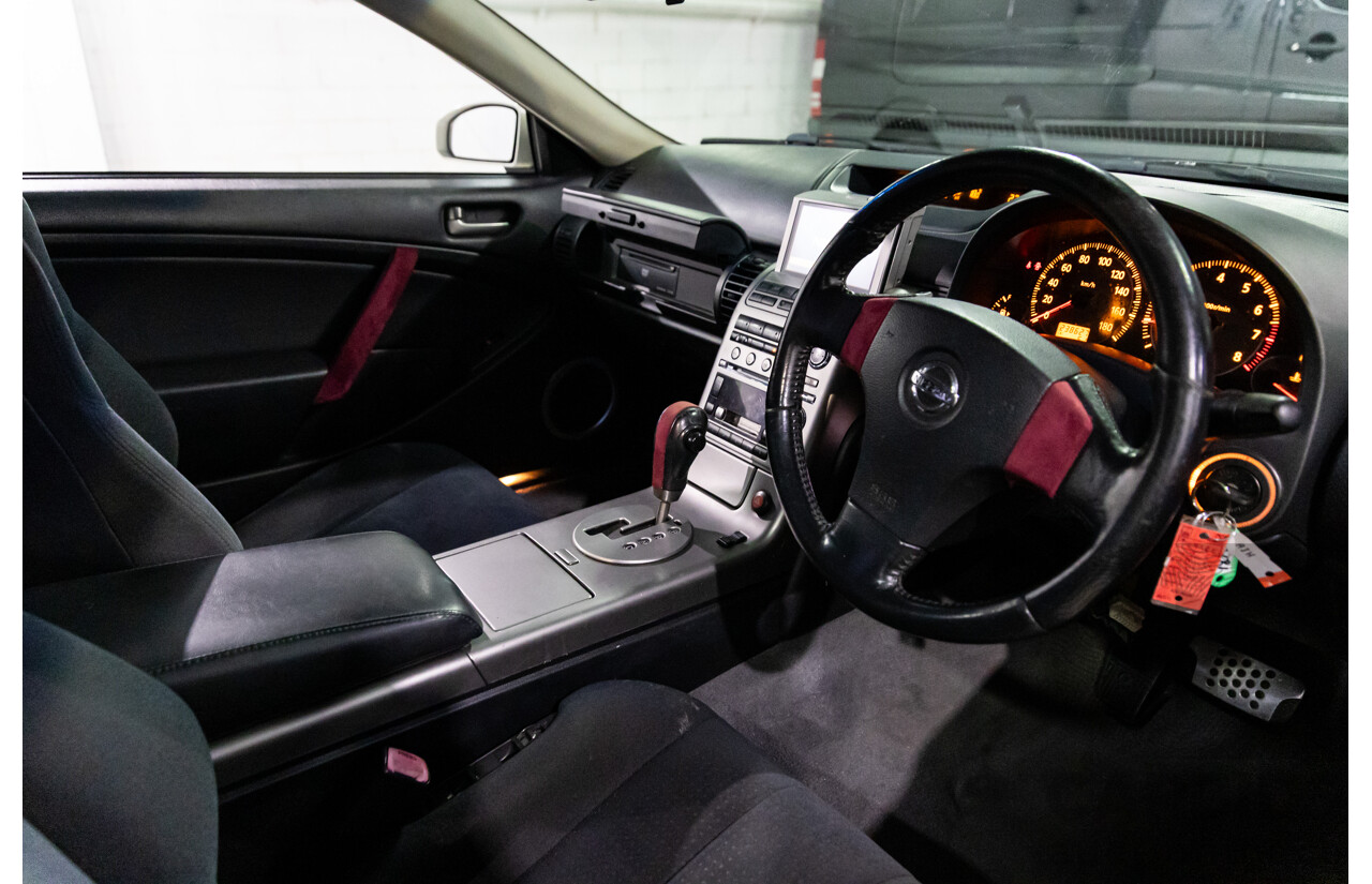 01/2003 Nissan Skyline 350GT V35 2d Coupe Ivory Pearl V6 3.5L - Import 6/16