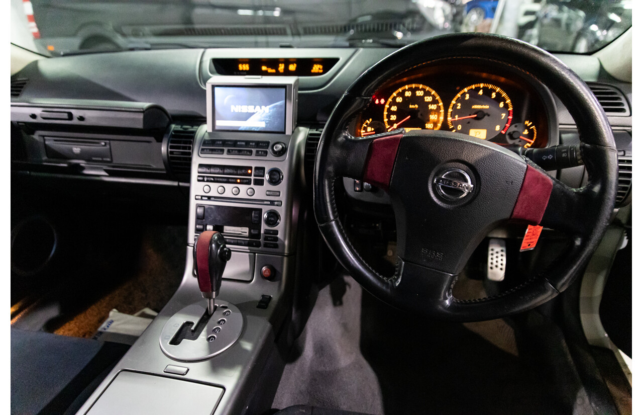 01/2003 Nissan Skyline 350GT V35 2d Coupe Ivory Pearl V6 3.5L - Import 6/16