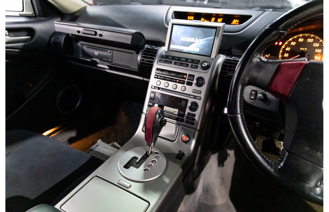 01/2003 Nissan Skyline 350GT V35 2d Coupe Ivory Pearl V6 3.5L - Import 6/16