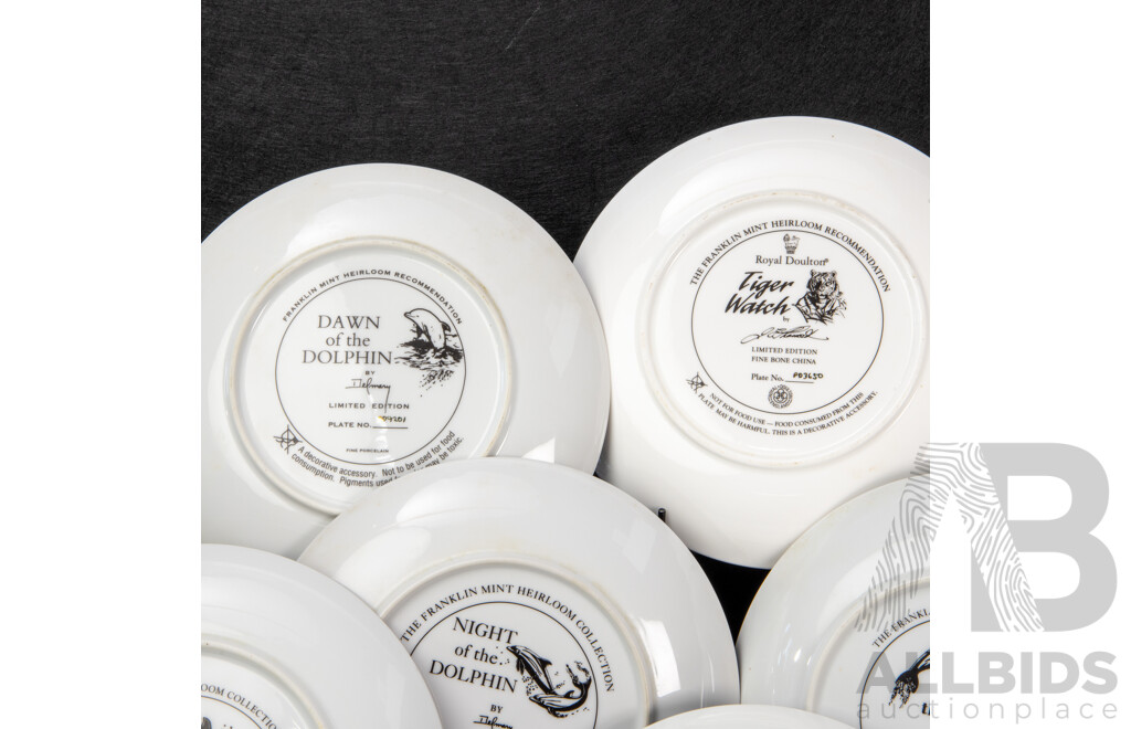 Collection of Eight Display Plates Including Royal Copenhagen 1966 Blackbird at Christmas, Franklin Mint Dolphins and Tiger, Bradford Exchange