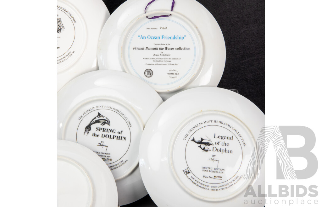 Collection of Eight Display Plates Including Royal Copenhagen 1966 Blackbird at Christmas, Franklin Mint Dolphins and Tiger, Bradford Exchange