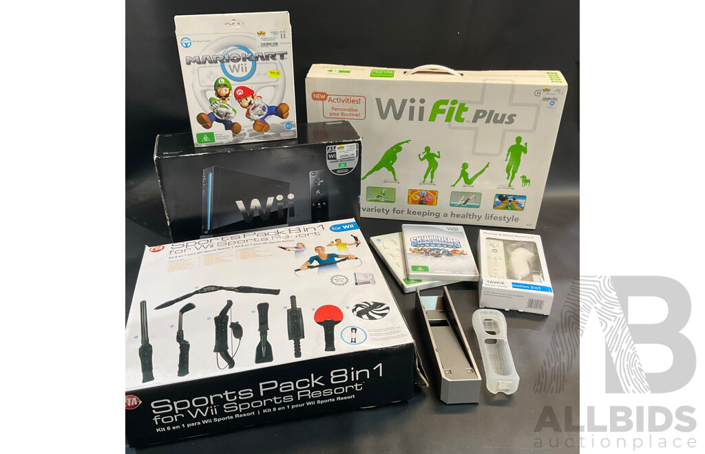 Nintendo Wii Console with Wii Fit Plus and MarioKart Game/Steering Wheel & Sports Pact 8 in 1 for Wii Sports Resort