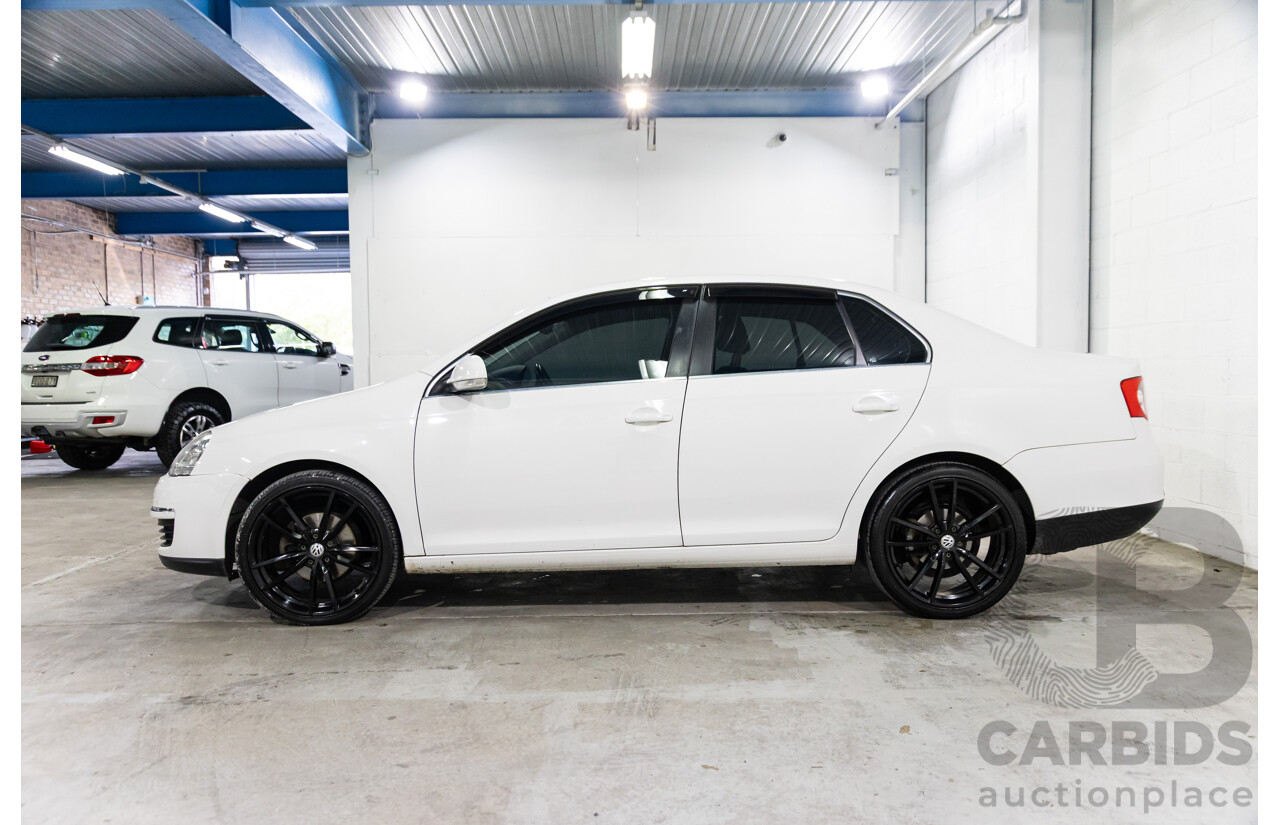 11/2009 Volkswagen Jetta 2.0 TDI 1KM MY08.5 4d Sedan Candy White Turbo Diesel 2.0L
