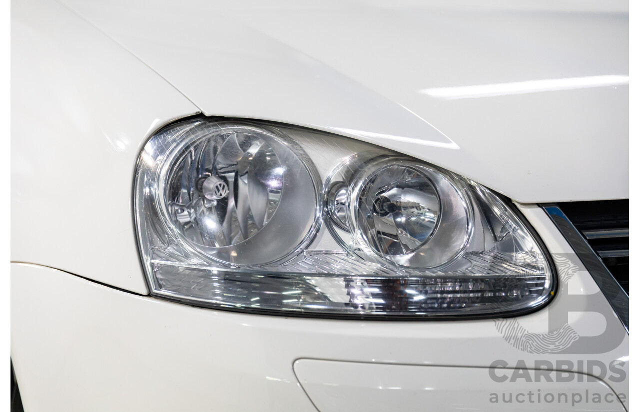 11/2009 Volkswagen Jetta 2.0 TDI 1KM MY08.5 4d Sedan Candy White Turbo Diesel 2.0L