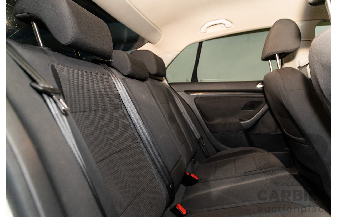 11/2009 Volkswagen Jetta 2.0 TDI 1KM MY08.5 4d Sedan Candy White Turbo Diesel 2.0L