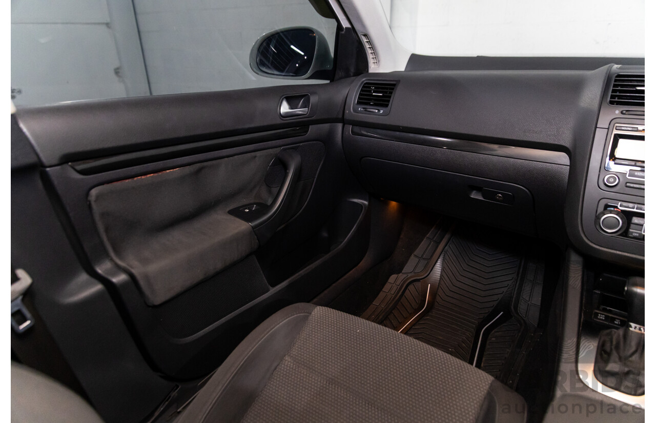 11/2009 Volkswagen Jetta 2.0 TDI 1KM MY08.5 4d Sedan Candy White Turbo Diesel 2.0L