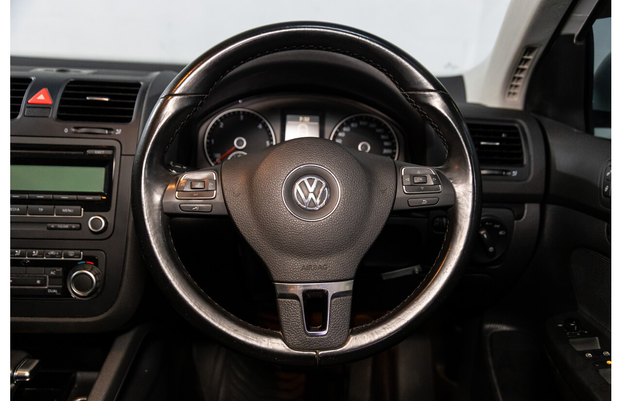 11/2009 Volkswagen Jetta 2.0 TDI 1KM MY08.5 4d Sedan Candy White Turbo Diesel 2.0L