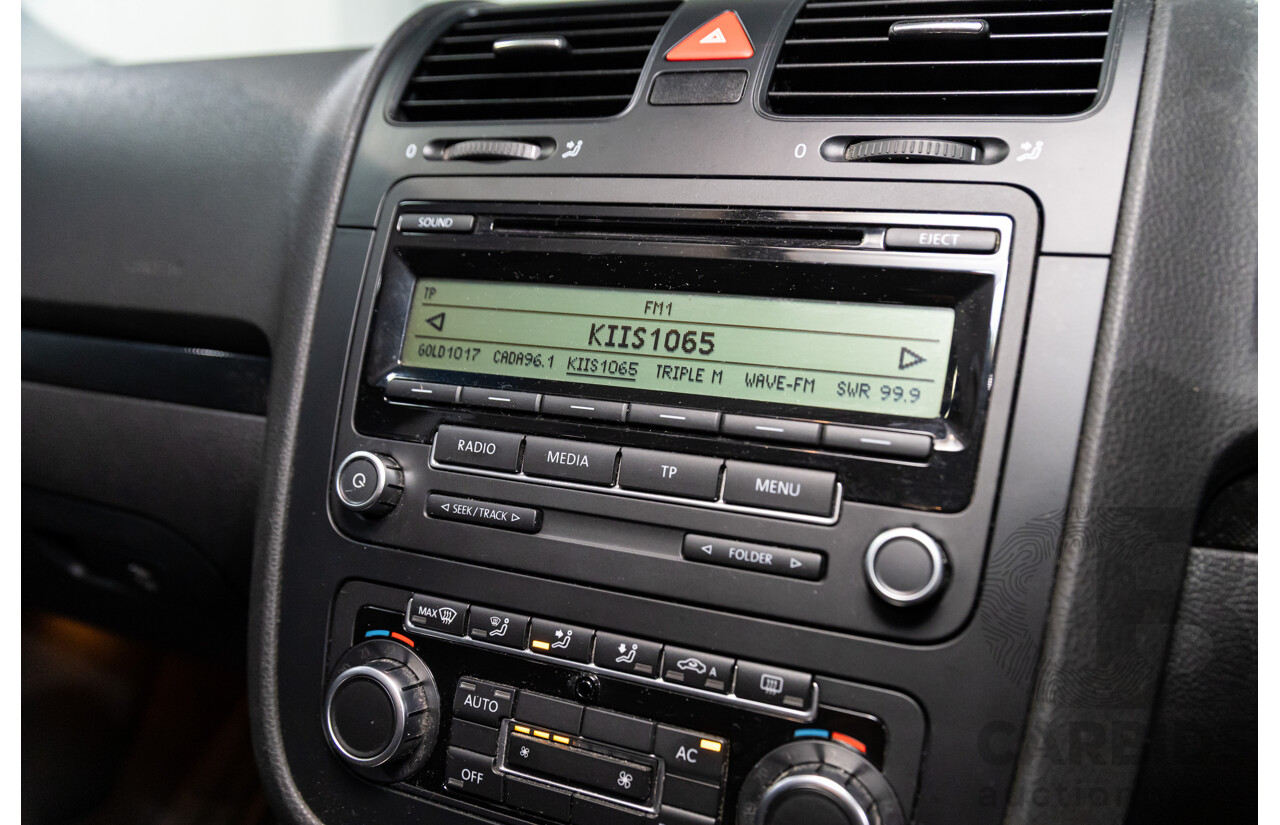 11/2009 Volkswagen Jetta 2.0 TDI 1KM MY08.5 4d Sedan Candy White Turbo Diesel 2.0L