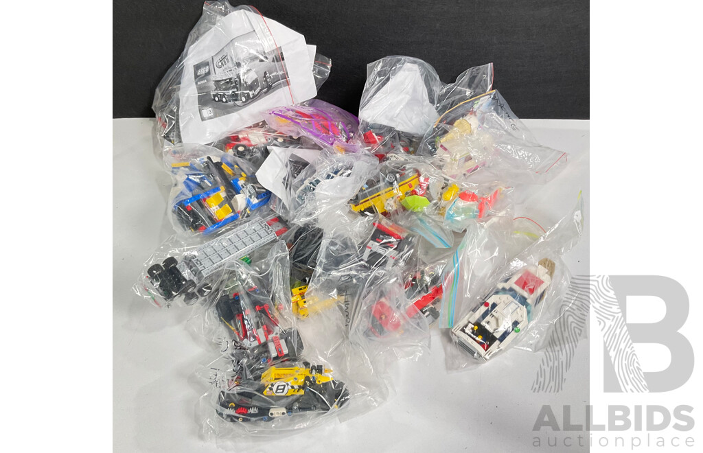 Box of Various Constructed Lego Vehicles
