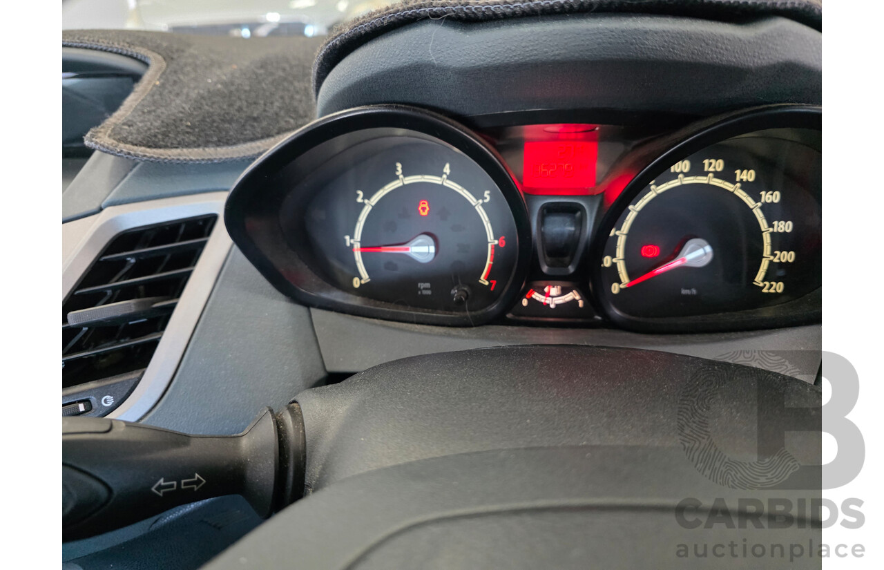 10/2009 Ford Fiesta LX WS 5d Hatchback Grey 1.6L