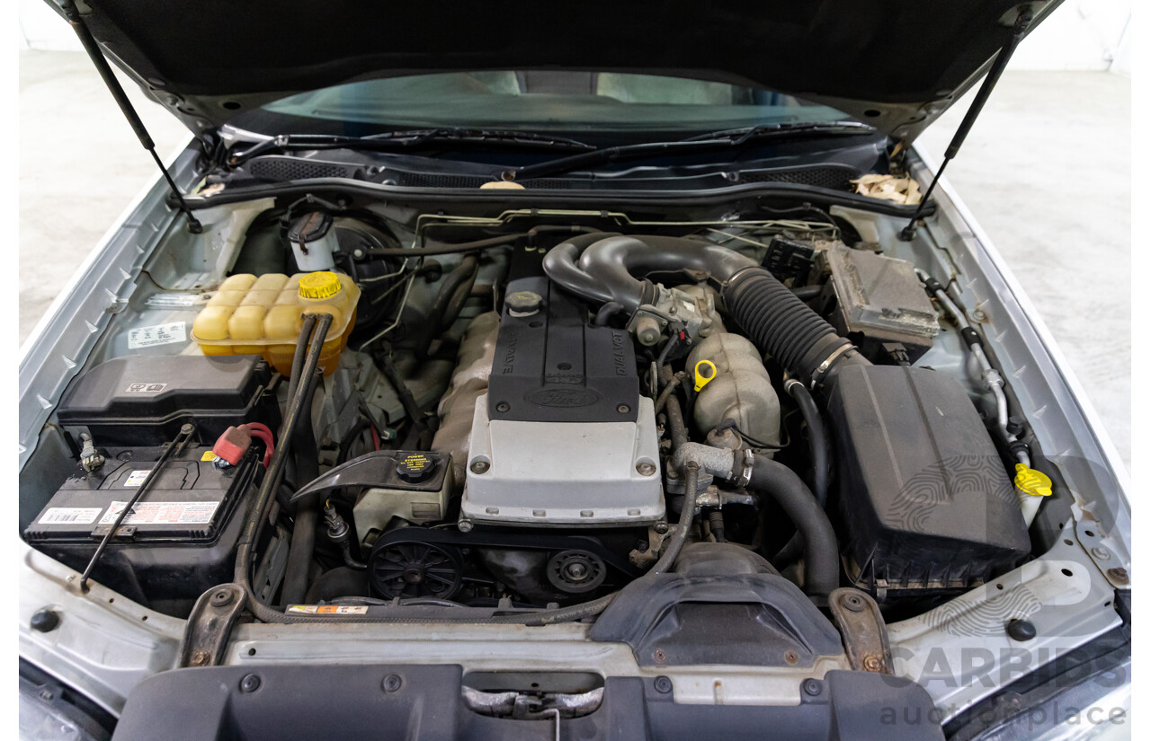 4/2004 Ford Falcon XT BA 4d Wagon Lightning Strike Silver Metallic 4.0L