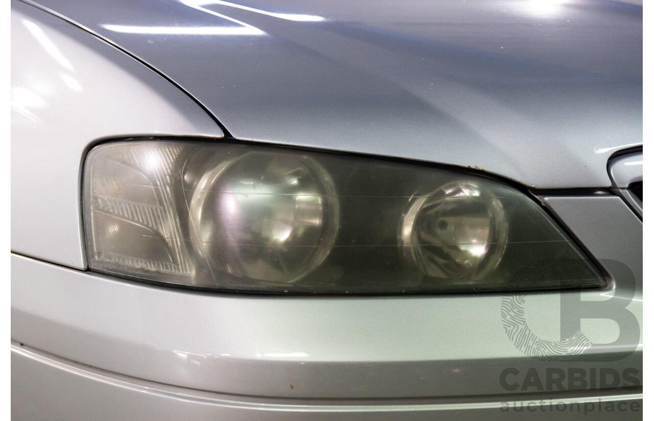 4/2004 Ford Falcon XT BA 4d Wagon Lightning Strike Silver Metallic 4.0L