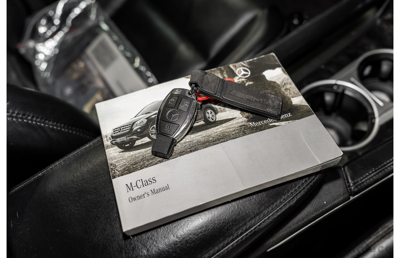 11/2008 Mercedes-Benz ML 63 AMG (4x4) W164 MY09 4d Wagon Obsidian Black Metalllic V8 6.2L