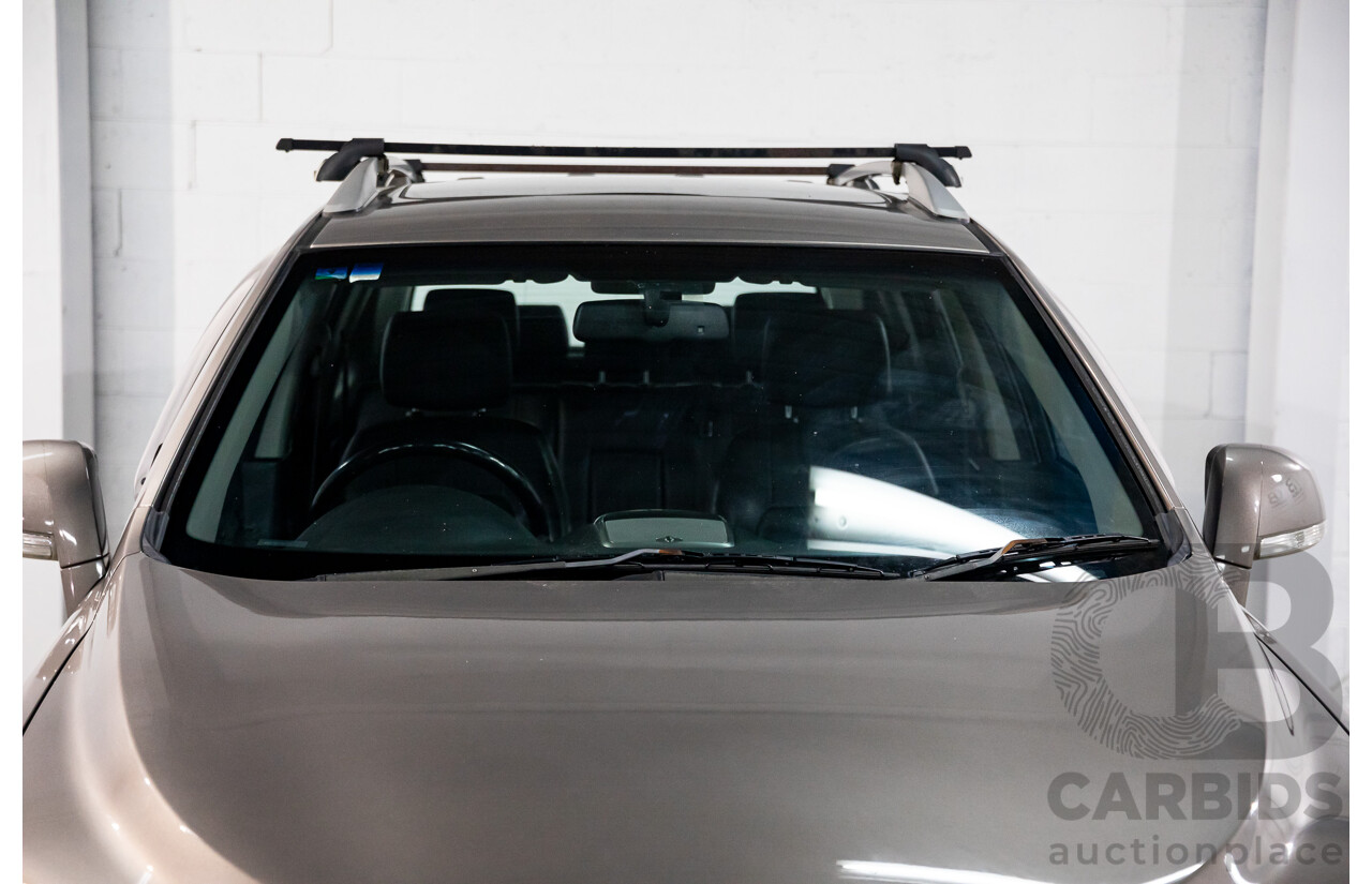 10/2014 Holden Captiva 7 LTZ (AWD) CG MY15 4d Wagon Champagne Silver Turbo Diesel 2.2L