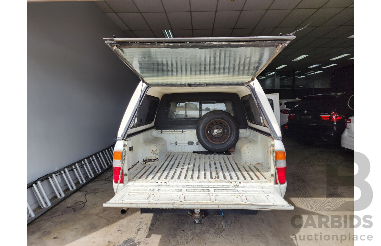 1/2000 Ford Courier XL PE Crew Cab P/Up White 2.6L